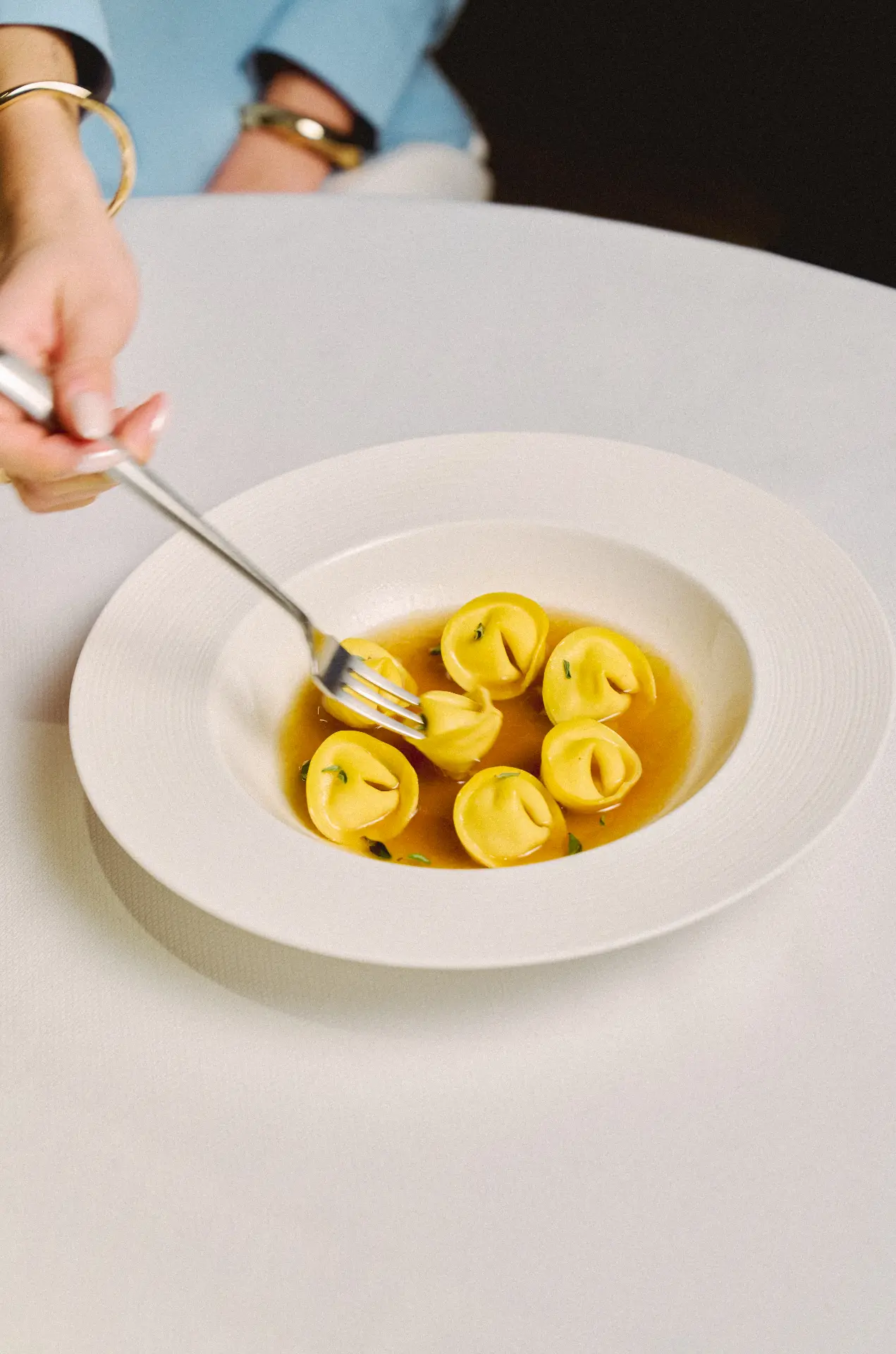 Handmade tortellini in broth